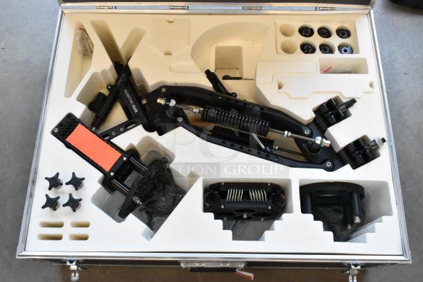 Flowcine Black Mount in hard case, components neatly placed in custom foam inserts, includes multiple fittings and accessories.