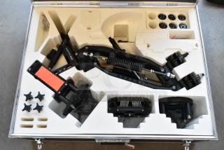 Flowcine Black Mount in hard case, components neatly placed in custom foam inserts, includes multiple fittings and accessories.