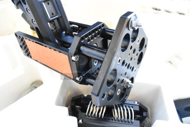 Flowcine Black Mount in hard case, features sturdy construction, multiple mounting holes, excellent condition.