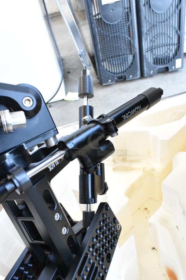Flowcine Black Mount, high-quality metal construction, shown in open hard case. Includes durable mount features and secure fittings.