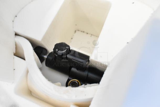 Flowcine Black Mount in white protective foam, housed in a hard case. Features adjustment dial, appears in excellent condition.