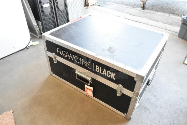 Flowcine Black Mount in hard case, labeled "Flowcine Black," with secure latches and heavy-duty construction.