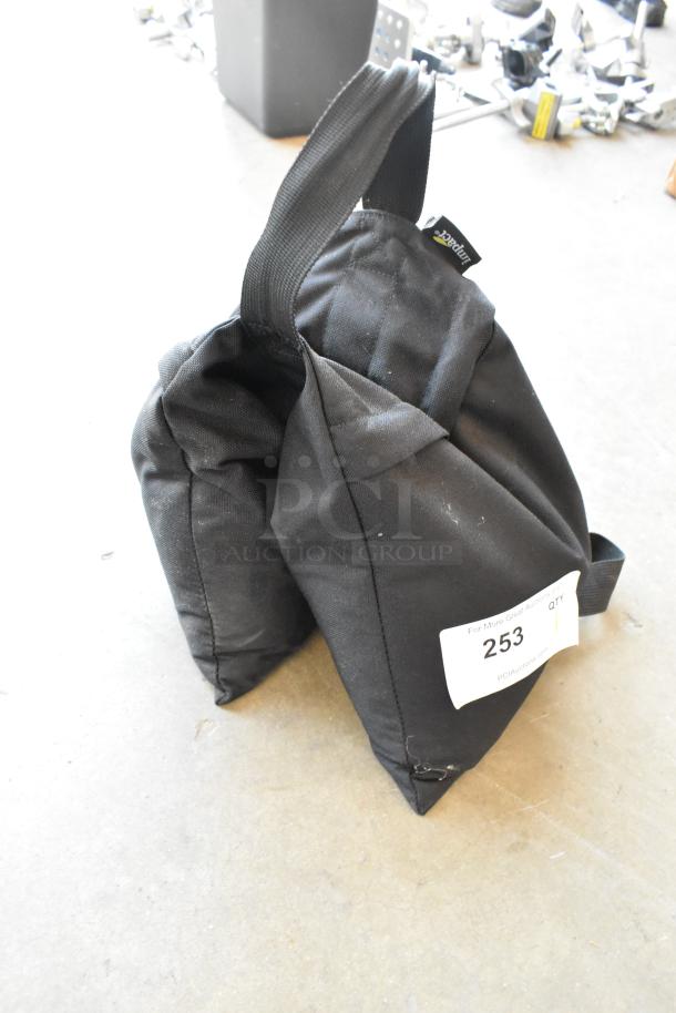 Impact SBF-B-25 Sandbag, black, dual compartment design, sturdy handle, slight wear, auction tag labeled "253."