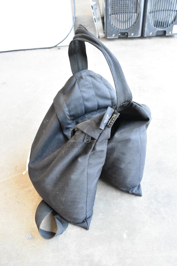Impact SBF-B-25 Sandbag; black, durable fabric, dual compartment, reinforced handles, visible label, good condition.