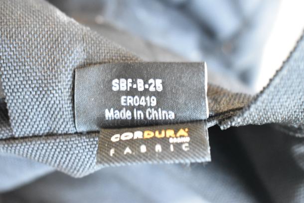 Impact SBF-B-25 sandbag, made in China, using durable Cordura fabric. Tag indicates model SBF-B-25 and ER0419.