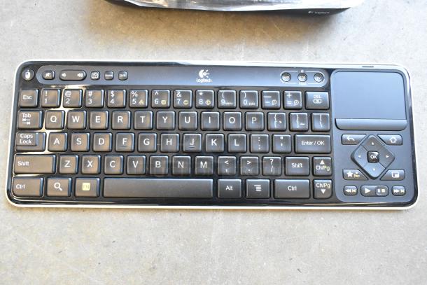 Logitech Revue media player keyboard, wireless, black, compact design, multimedia keys, used condition.