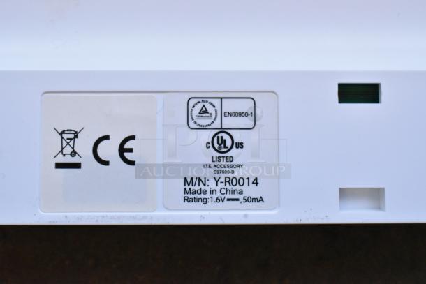 Logitech Revue Media Player label showing model Y-R0014, made in China, 1.6V, 50mA rating.