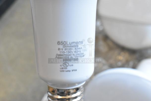 Sylvania LED lightbulb, 650 lumens, dimmable 8W 5000K; labeled 110-130V; assembled in Mexico; CE and UL listed.
