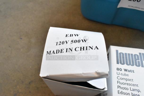 Lot of Lowel lightbulbs in a poly bin, includes EBW 120V 500W bulbs and 80W U-tube fluorescent photo lamps, boxed.