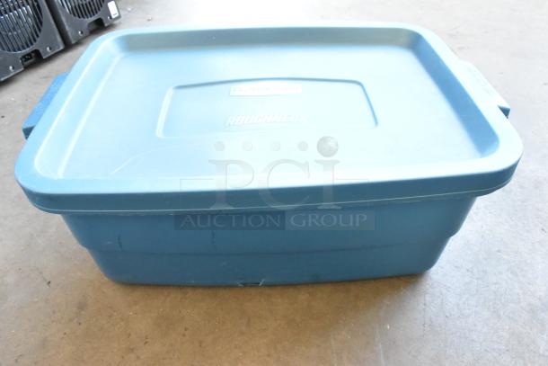 Poly bin containing a lot of Lowel lightbulbs. Blue Rubbermaid Roughneck bin. Condition: Good.
