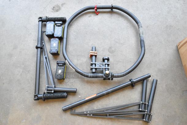 Movi Ring with four batteries, carbon fiber construction, lightly used, with mounting accessories. Ideal for stabilizing video gear.