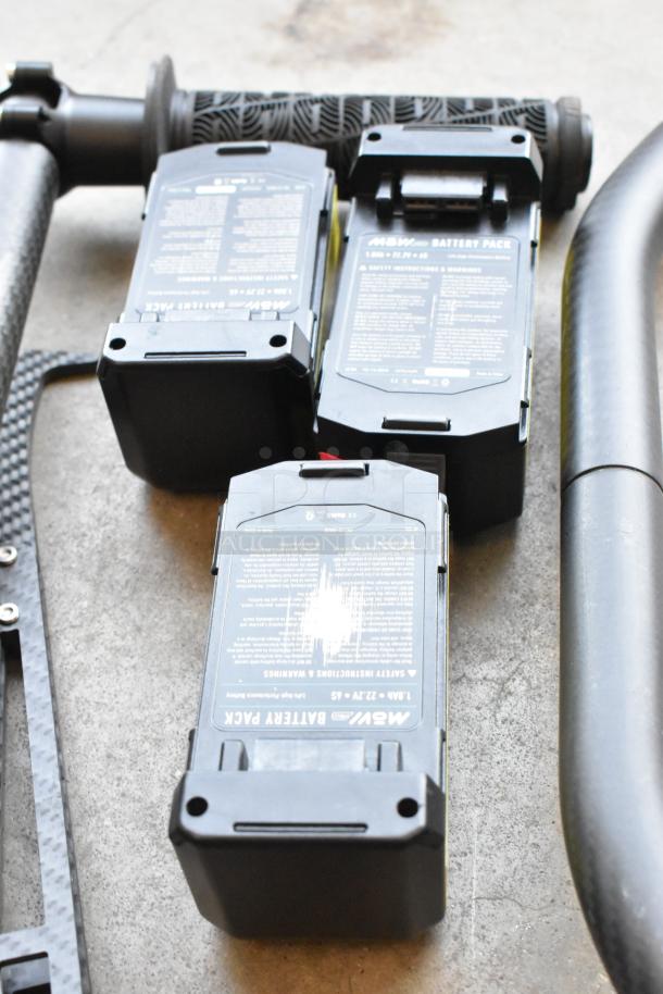 Movi Ring with batteries, featuring three visible black battery packs labeled "Movi Battery Pack," in good condition.