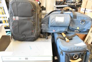 Two bags including a Petrol camera bag and a Porta Brace equipment case, in good condition. Black and blue designs.
