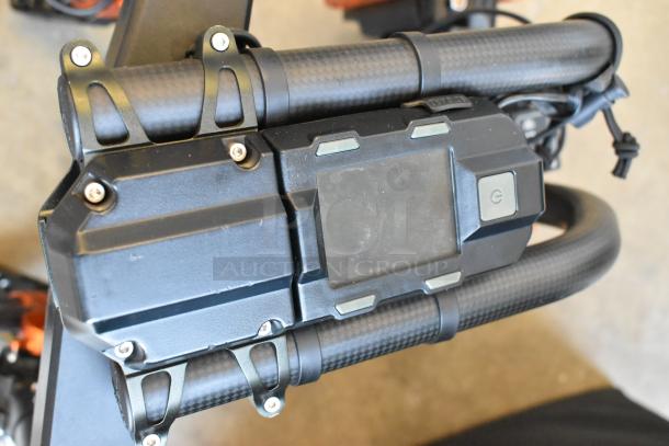 Digi Ignite metal frame, durable black metal, mounted on carbon fiber handlebars with secure brackets, in excellent condition.