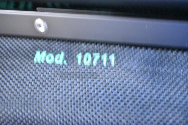 Westcott Basics Omni Stand Model 10711 tag, showcasing model number on textured fabric surface.