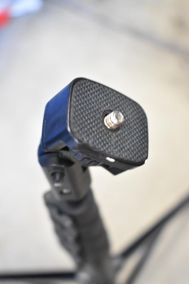 Chimera Tripod with textured mount plate; sturdy design, appears in good condition, ideal for cameras.
