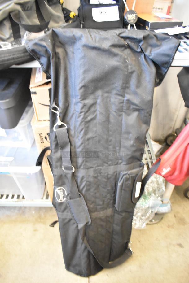 Impact Backdrop Support Kit in black case, featuring adjustable straps and durable fabric. Ideal for photography use.