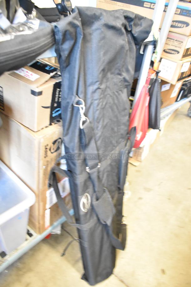 Impact Backdrop Support Kit, stored in black carrying case, features durable handles and secure zipper closure.