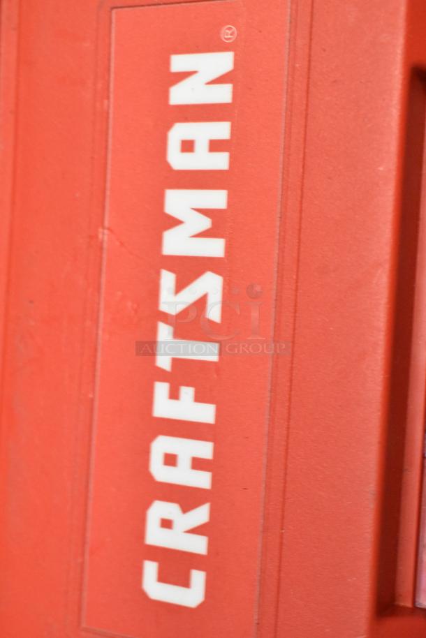 Red Craftsman toolbox with visible logo. Includes Husky and Craftsman toolboxes, both measuring 16x9x29 inches.