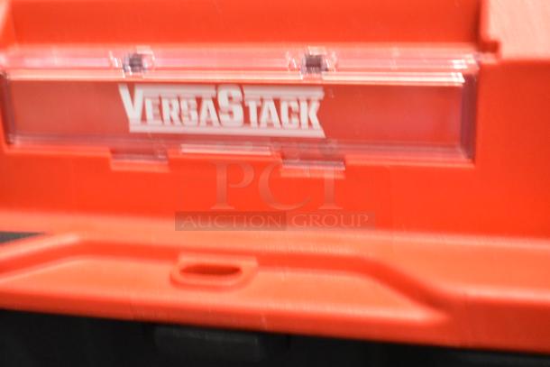 Red VersaStack toolbox with label, part of a set including Husky and Craftsman toolboxes, 16x9x29 inches.