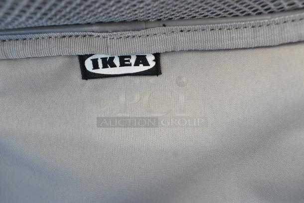 Lot of 4 IKEA soft bags in gray fabric. Visible IKEA label. Bags are in good condition.