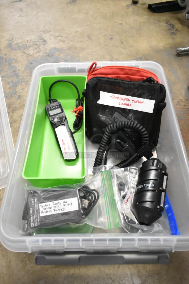 ALL ONE MONEY! Lot of Time Lapse Programmer, Timelapse Tether Cables and Cord Cable Holder in Poly Bin - Image 1 of 8
