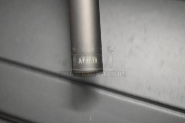 Brand new Audio Technica AT0015 microphone, close-up of model marking, four available, each in original box.