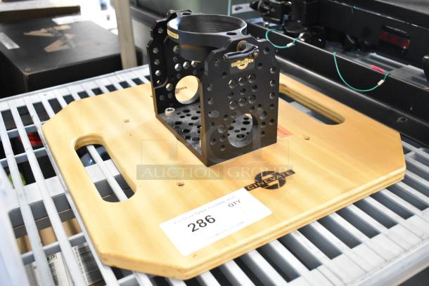 Cinevate wooden plank with metal unit, features cut-out handles, Cinevate logo, and numbered label, in good condition.