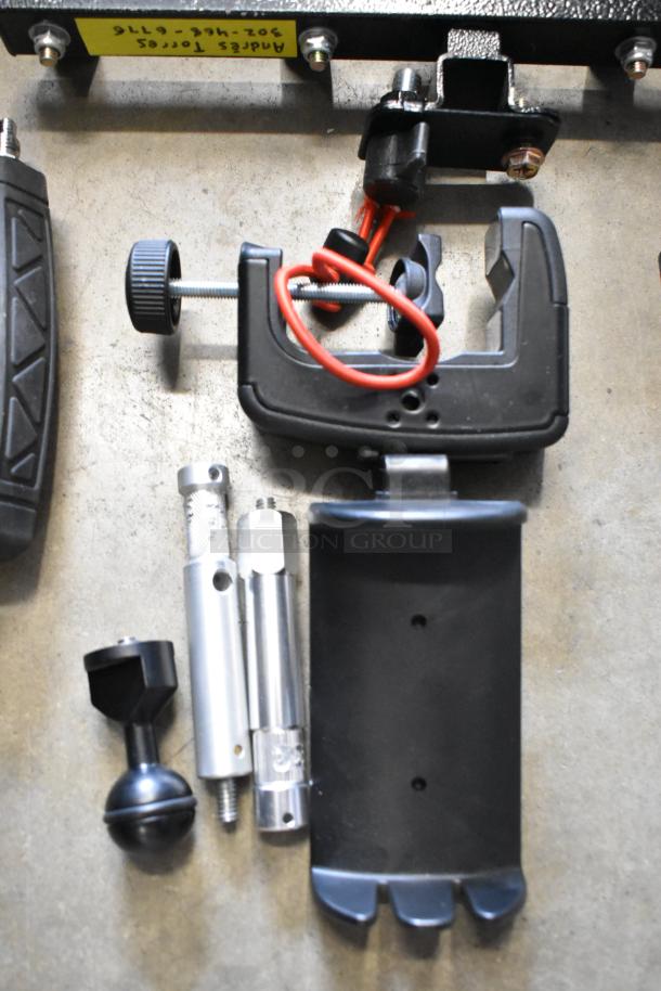 Lot of various items including Kessler pieces, featuring assorted metal and plastic components in fair condition. Marked with labels including contact details.