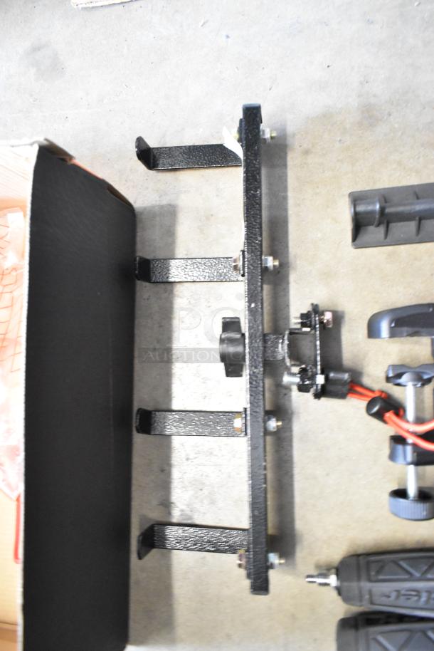 Lot of various items, including Kessler components, assorted metal brackets, and clamps. Good condition, no visible markings.