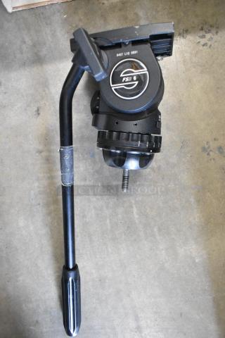 Sachtler FSB 6 MK II Fluid Head with Sideload Mechanism, used, visible model marking 0407 L12 9531, on concrete surface.