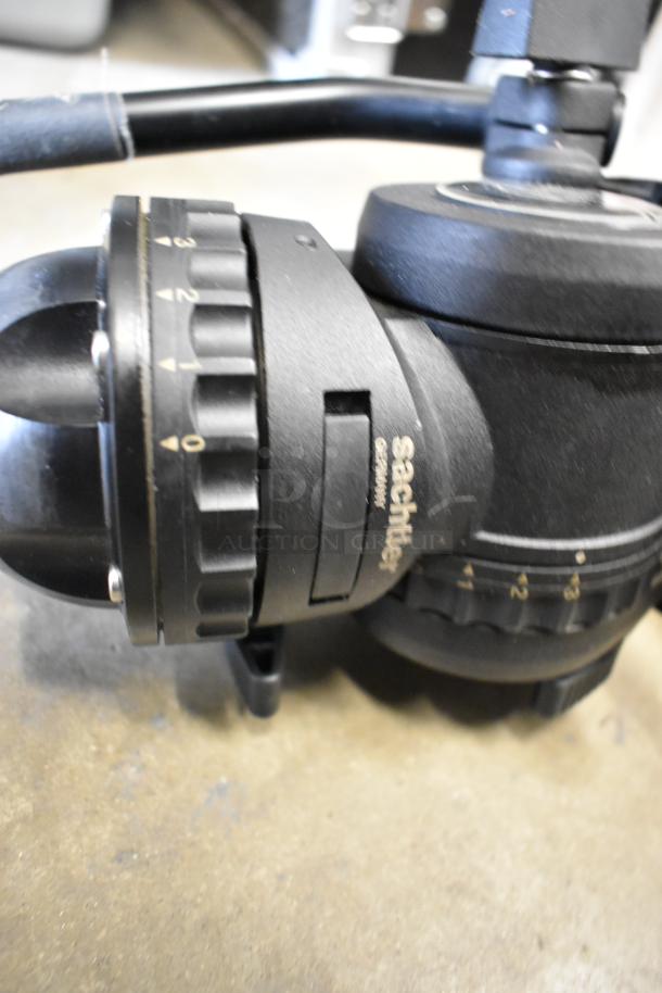 Sachtler FSB 6 MK II Fluid Head with sideload mechanism, 
used condition, visible adjustments and branding logo.