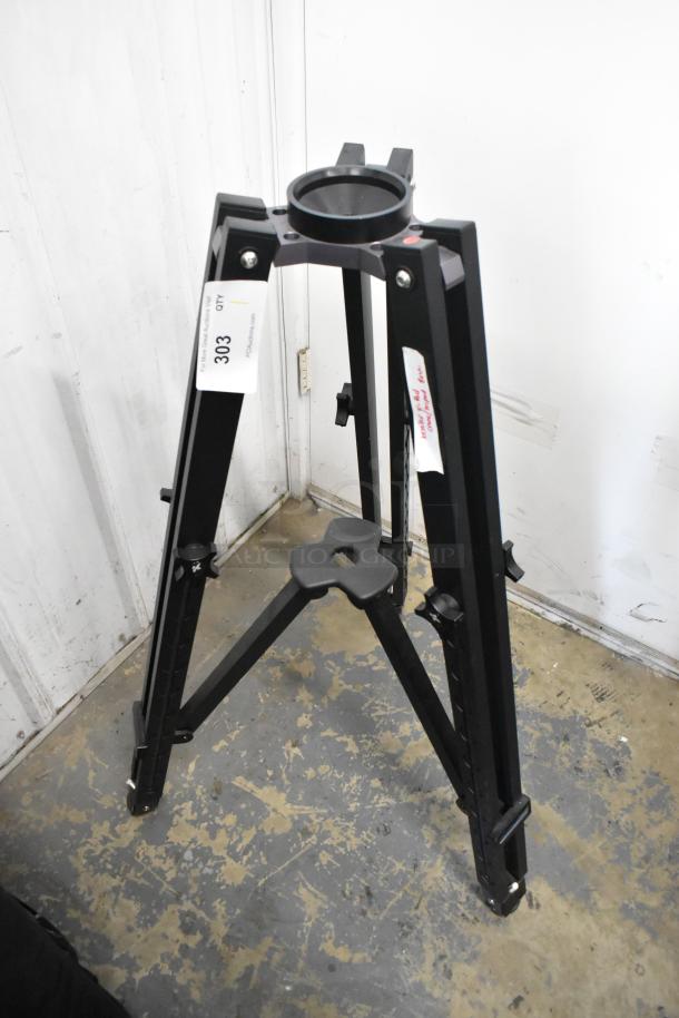 Kessler Tripod with black metal frame, sturdy construction. Auction tag indicates item and lot number. Good condition.