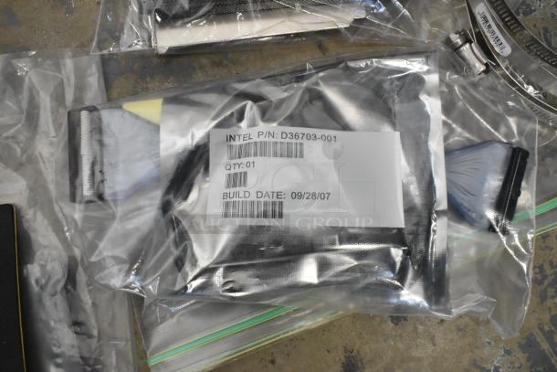 Lot of electronics including Kableflags, wires, and Vault Equipment Case. Visible Intel P/N: D36703-001, Build Date: 09/28/07.