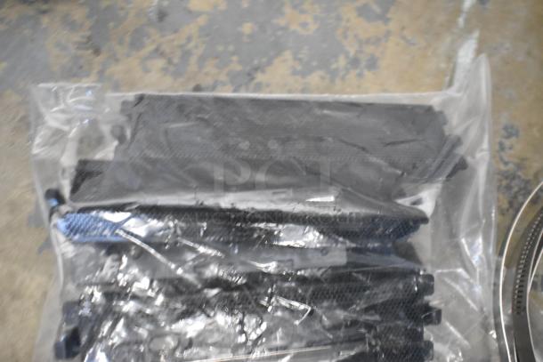 Lot of miscellaneous items including Kableflags, wires, and a Vault equipment case, sealed in plastic bag.