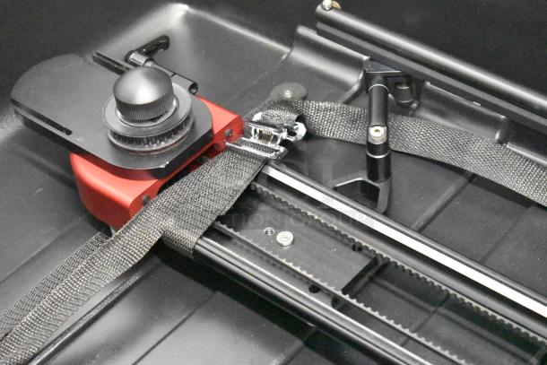 Philip Bloom Pocket Dolly in hard case, featuring a black and red rail system, straps, in good condition.