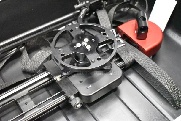 Philip Bloom Pocket Dolly in hard case, featuring a black metal construction, smooth sliding mechanism, in like-new condition.