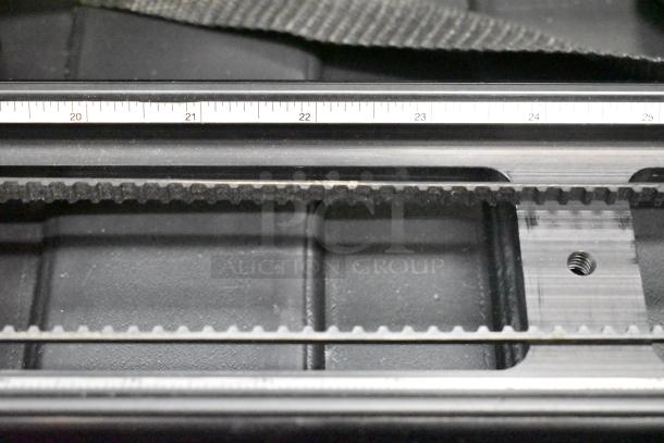Philip Bloom Pocket Dolly in hard case, featuring a precision ruler and gear belt system, in excellent condition.