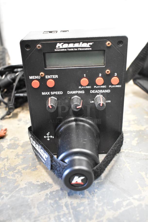 Kessler filmmaking unit with controls and display, includes Power Sonic PS-1270F1 rechargeable battery in a protective case.