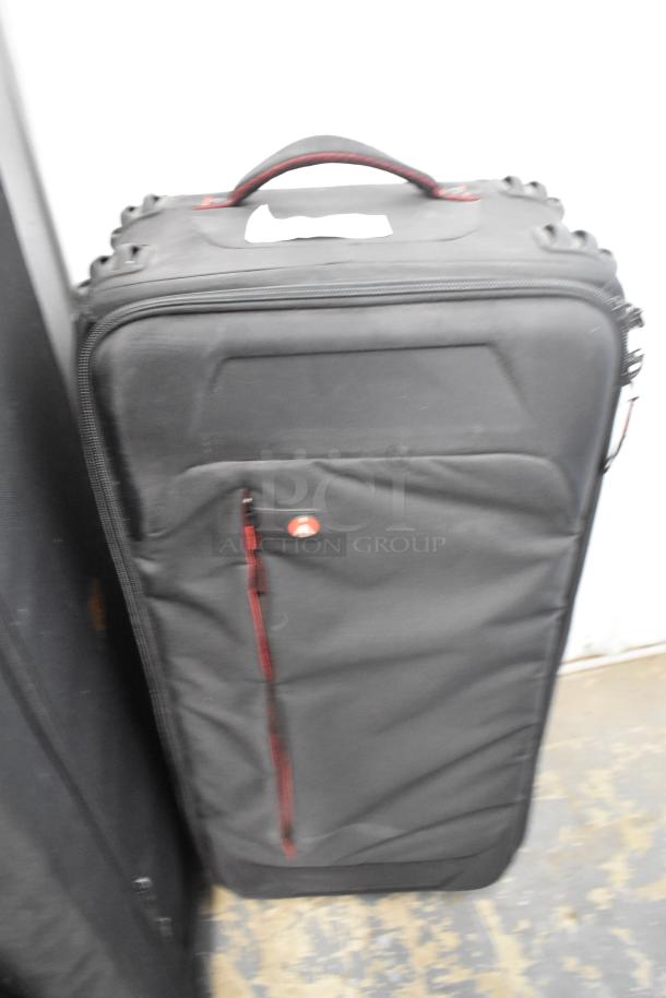 Black Kessler filmmaking unit case with handle, includes Power Sonic PS-1270F1 rechargeable battery. Sturdy condition.