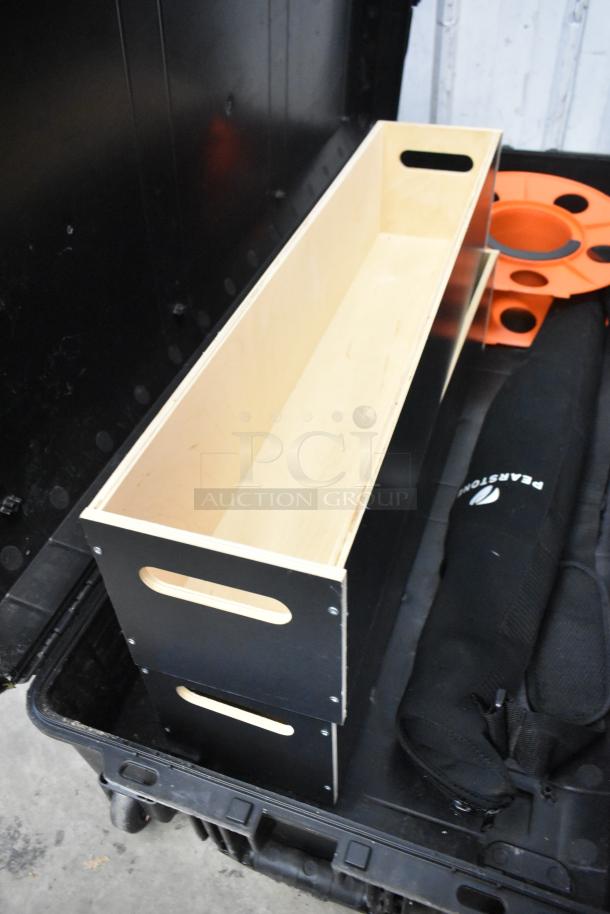 Pearstone Unit in Pelican Air hard case, featuring a black wooden box with handle cutouts. Visible Pearstone branding.