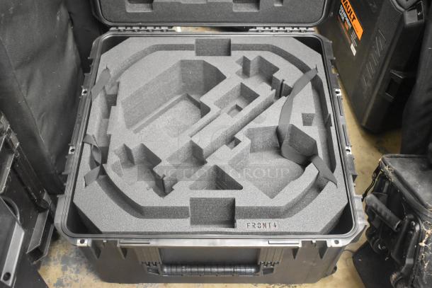 SKB Hard Case with custom foam interior. Sturdy black exterior, reinforced corners. Excellent condition. "FRONT" label visible.