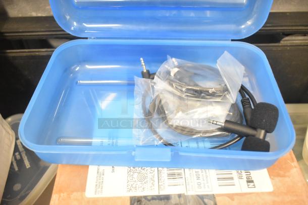 Pelican hard case with adapters, Zip Linq cables, and poly containers visible. Case in good condition, items organized inside.