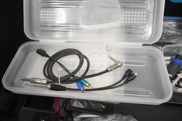 Pelican hard case with assorted adapters, Zip Linq cables, stored in clear poly containers, excellent condition.