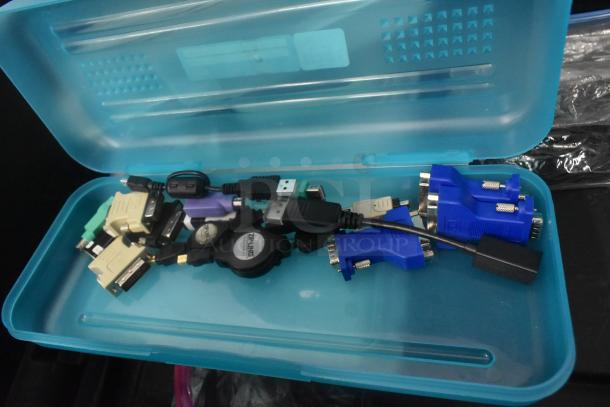 Pelican hard case with various adapters and connectors, including Zip Linq and poly containers, in good condition.