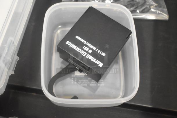 Pelican hard case with adapters, Zip Linq, Marshall Electronics splitter in poly container, gently used condition.