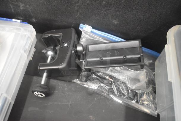 Pelican hard case contents include adapters, Zip Linq cables, and poly containers. Features black clamp, in good condition.