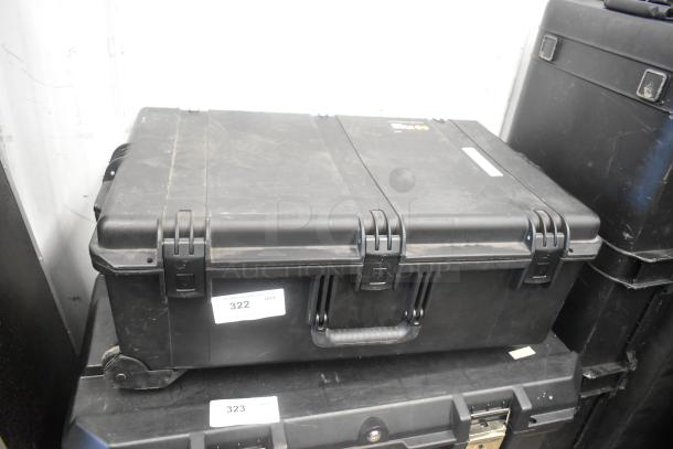 Ditogear hard case with locks, containing cables, Vipow LP7.5-12 battery, Dragon Frame, and Ditogear unit, shows slight wear.