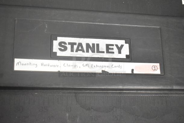 Stanley hard case with mounting hardware, clamps, SM extension cords, air blowers, Ethernet cables, viewfinder; labeled.
