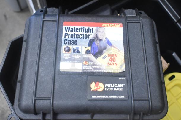 Pelican 1200 Watertight Protector Case with contents including mounting hardware, clamps, cords, and viewfinder.